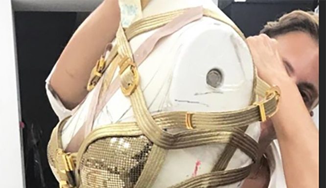 Jennifer Lopez rang in her 50th birthday in a $21k custom Versace dress